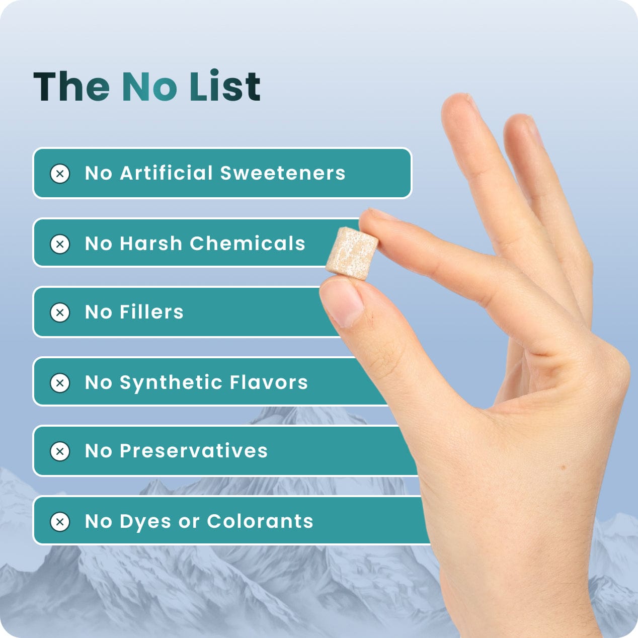 Hand holding a small square supplement next to a list of ingredients.