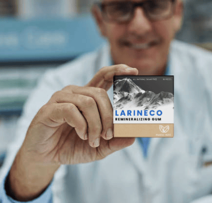 Pharmacist holding Larineco remineralizing gum